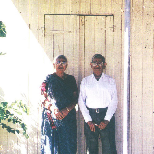 Kanji Tappoo and his wife outside the shop